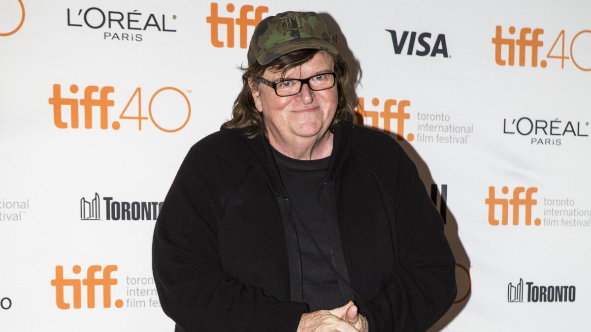 Michael Moore’s Film “Fahrenheit 9/11” Premiere and His Impact