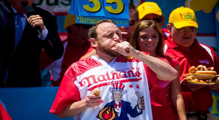 Joey Chestnut Proudly Reclaims Hot Dog Eating Crown